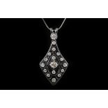 An 18ct white gold, large Art Deco style diamond l