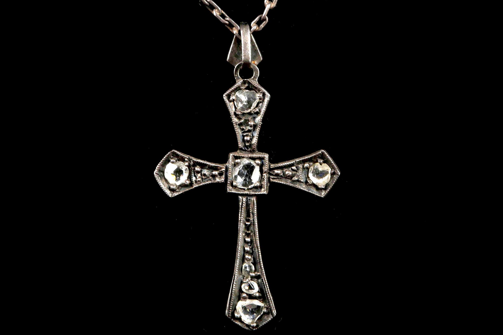 An antique silver and rose cut diamond set cross p