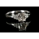 An 18ct white gold and diamond engagement ring, ce