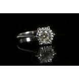 An 18ct white gold diamond solitaire ring. Total D