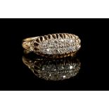 A Victorian 18ct gold and pave' set diamond ring,