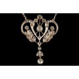 An art nouveau low carat gold foliate scroll penda