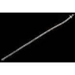 A 14ct white gold diamond tennis bracelet. Total D