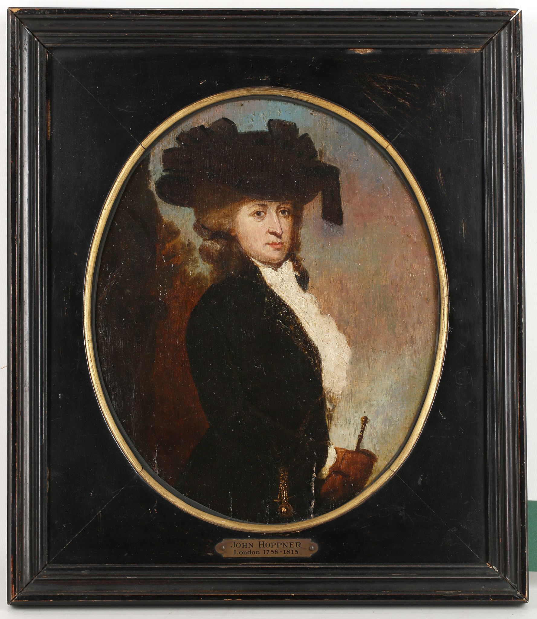 Follower of John Hoppner 1758-1815. 'Portrait of a Lady with Riding Crop'. Oil on oval panel, with