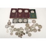 A collection of silver and cupro nickel coins to include two 1935 crown, N/C four 1951 crowns cased,