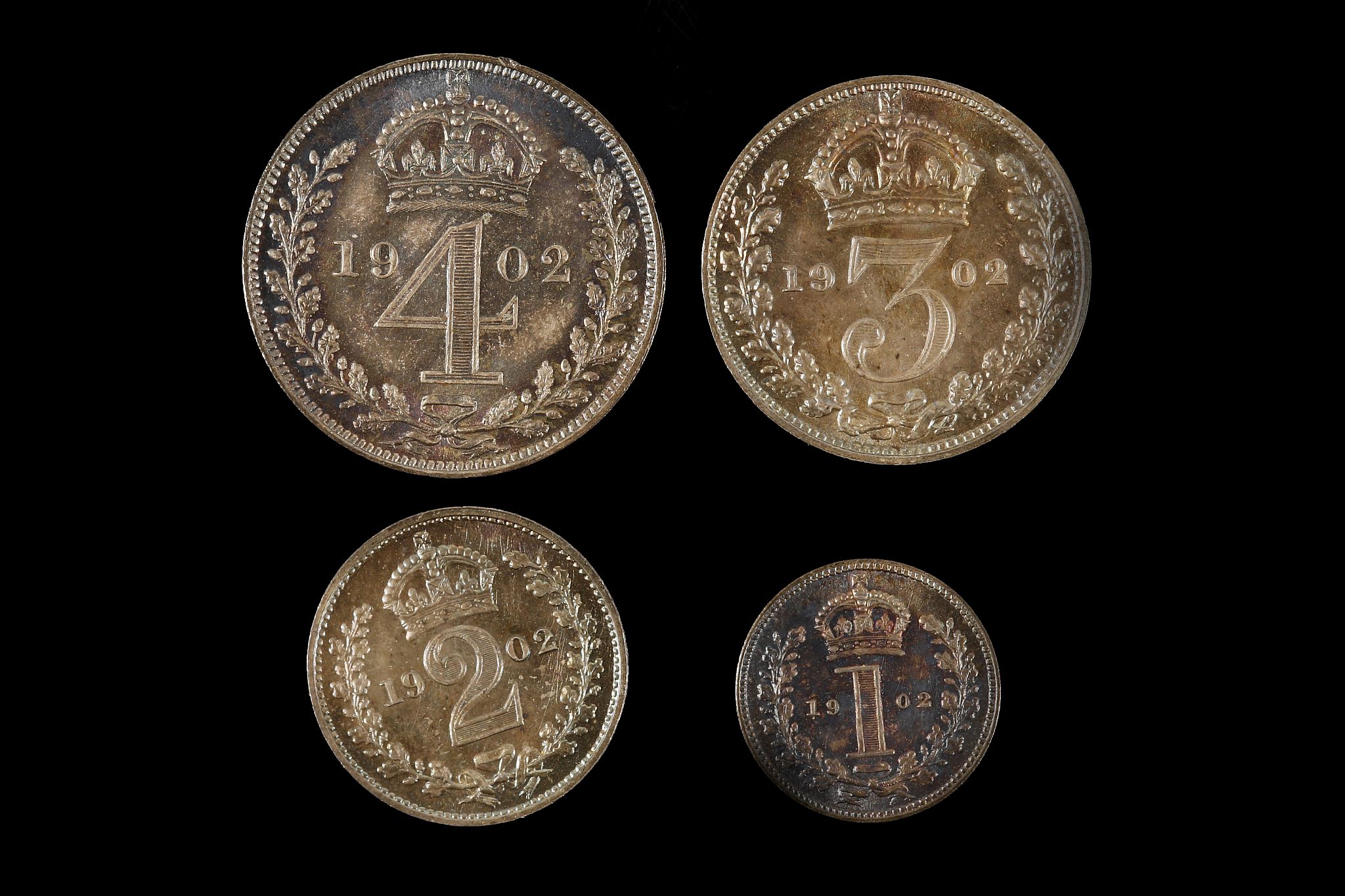 Edward VII 1902, maundy set of four coins in a red leather case with gilt enrichment, bust right /