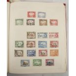 A collection of stamps, contained in a red loose leaf album and includes strength to South Africa