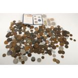 A collection of coins to include pennies, half pennies, sixpences, half crowns, Indian rupees,