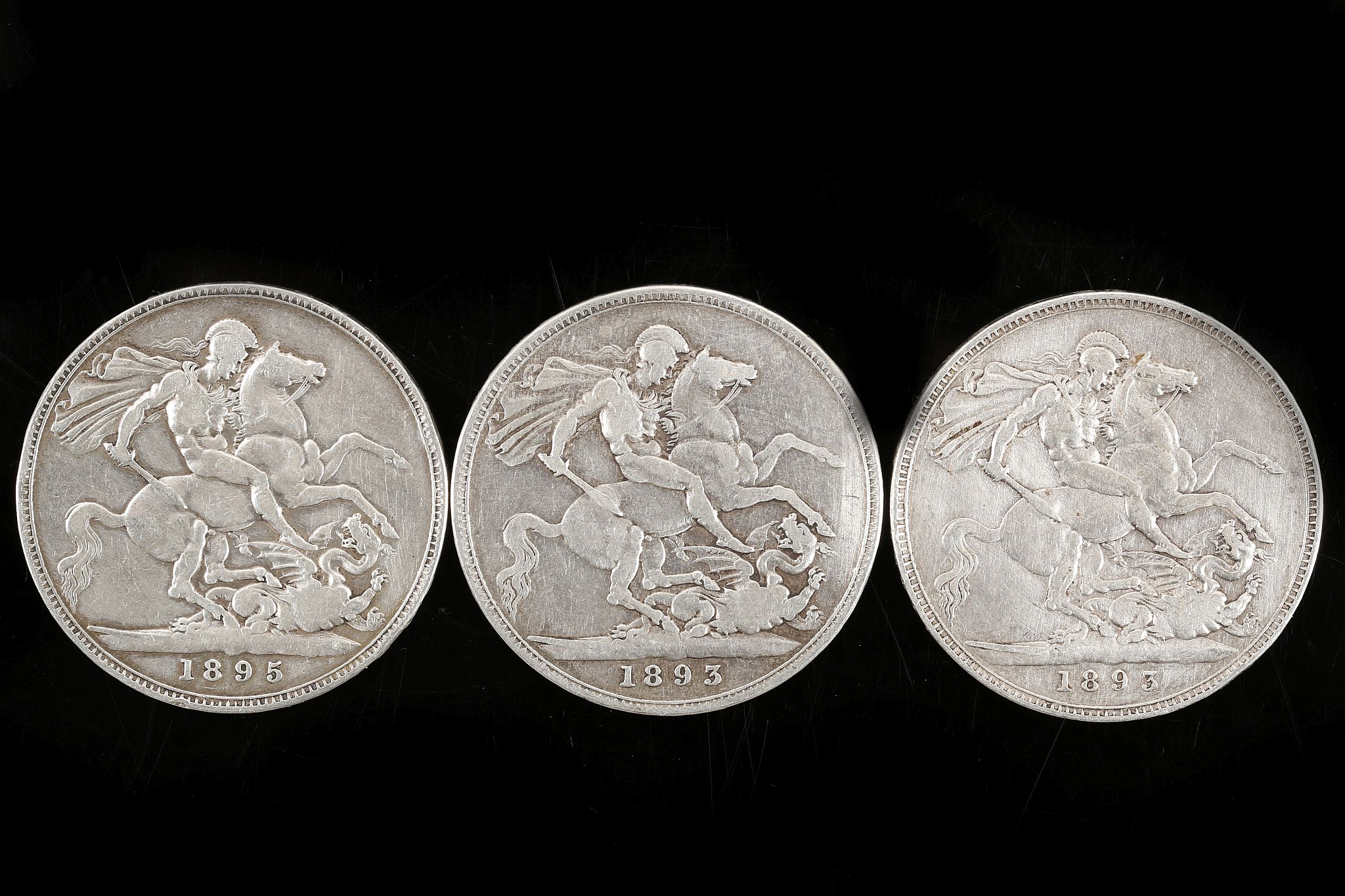 Three Victorian crowns 1893 x 2 1895, all with jubilee heads and inscribed edges (3).