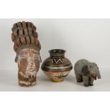 Three West African artefacts, including a terracotta head, a jar and an elephant wood figure (3).