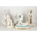 An early 19th century Derby porcelain parian allegorical group with and angel, incised crown and D
