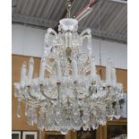 An eighteen branch chandelier, with various faceted glass drops, approx. 1m tall.