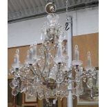An eighteen branch chandelier, with various faceted glass drops, approx. 1m tall.