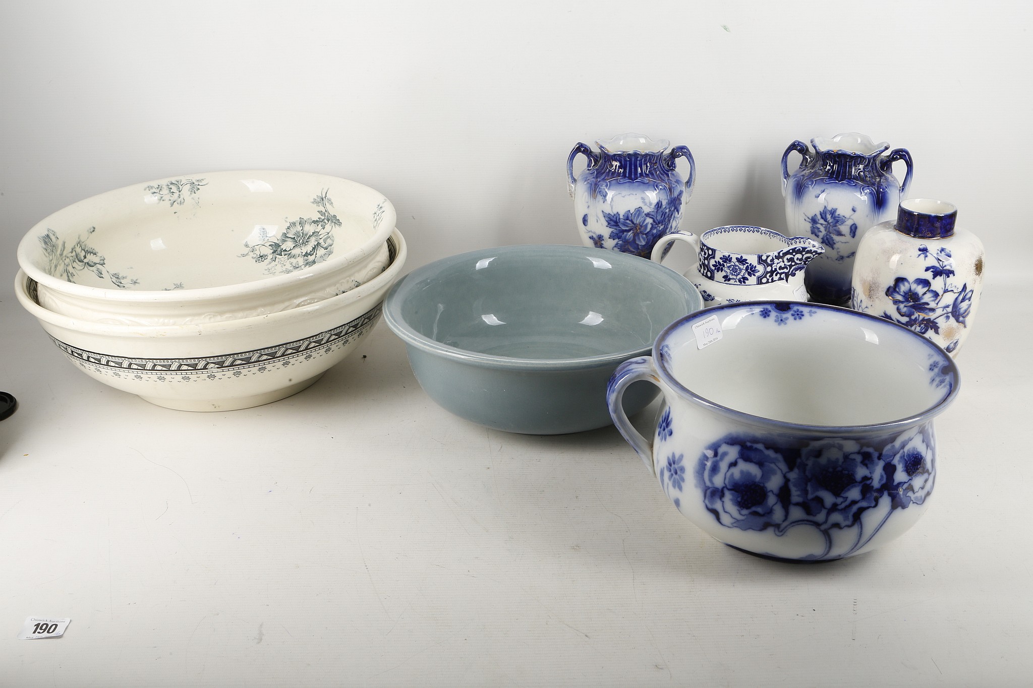 A collection of Staffordshire pottery bowls, vases etc, including a Royal Doulton chamber pot