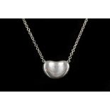 A Tiffany & Co .925 silver 'Bean' pendant with original chain and pouch.