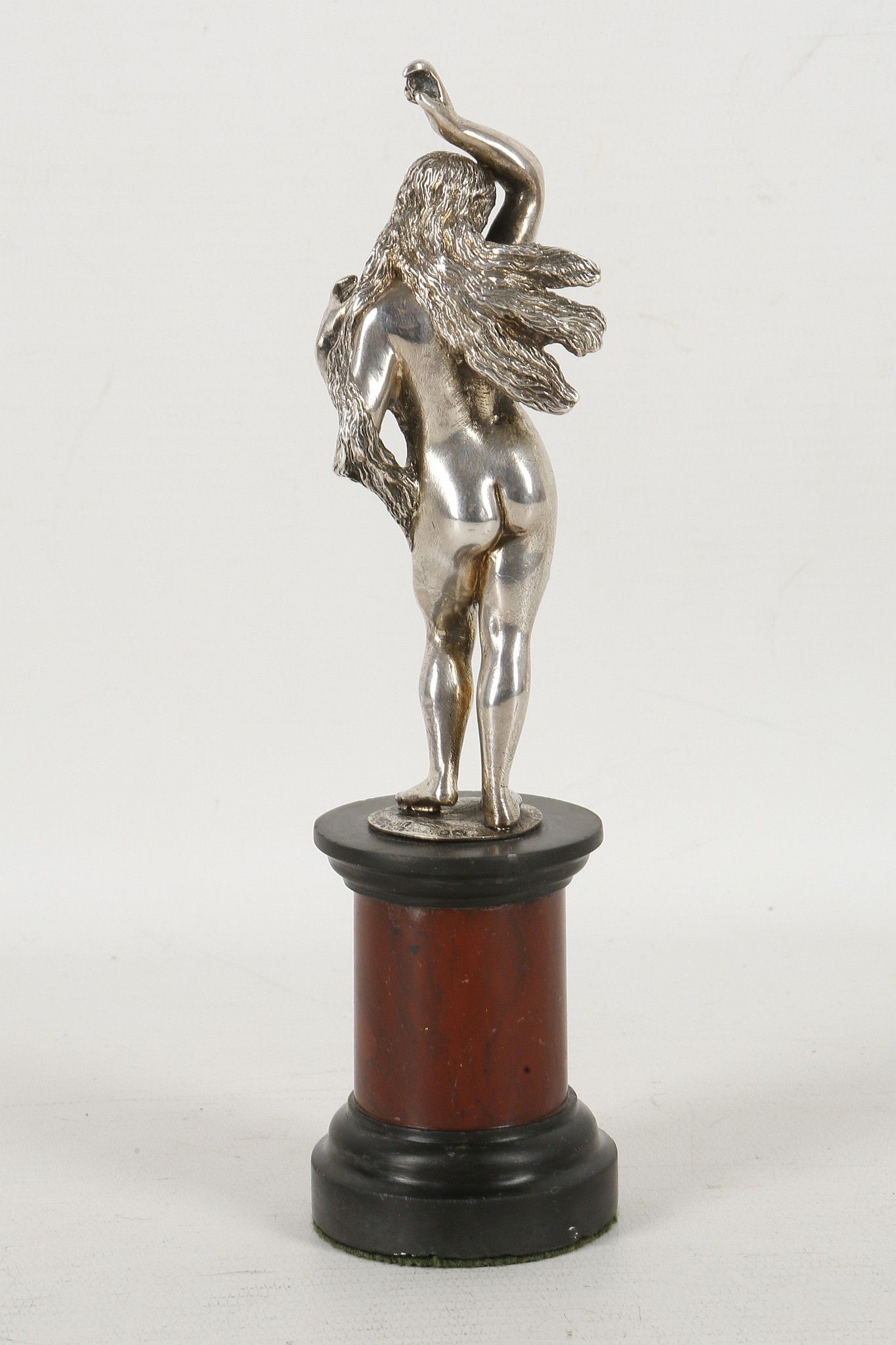 A 19th century hallmarked silver statuette of Venus. supported on a black and red marble base, 17. - Image 2 of 3