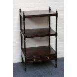 A 19th century mahogany what-not, with turned supports, three tiers and single drawer, 55 x 41cm.