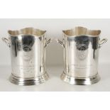 A pair of silver plate twin handle wine coolers.