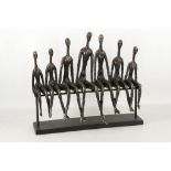'Sitters on a Beach' a Giacometti style bronze effect sculpture.