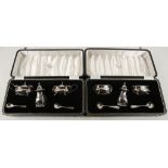 A boxed hallmarked silver three piece cruet set with spoons by Harrods of London, 1977, together