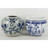 A Chinese blue and white figurative jardinere, together with a celadon blue and white Fo dog