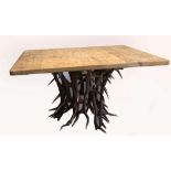 A MODERN ELK ANTLER TABLE - the antler base of circular form with square reclaimed pine top, one