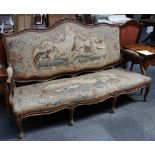 A French carved stained beechwood and upholstered three piece suite circa 1890. In the Louis XV