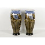 Royal Doulton c.1900, a pair of baluster form vases with Art Nouveau decoration, 27.5cm high,