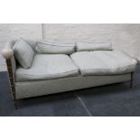 A contemporary sofa in the manner of Mark Brzier Jones, with copper covered back, sculptural