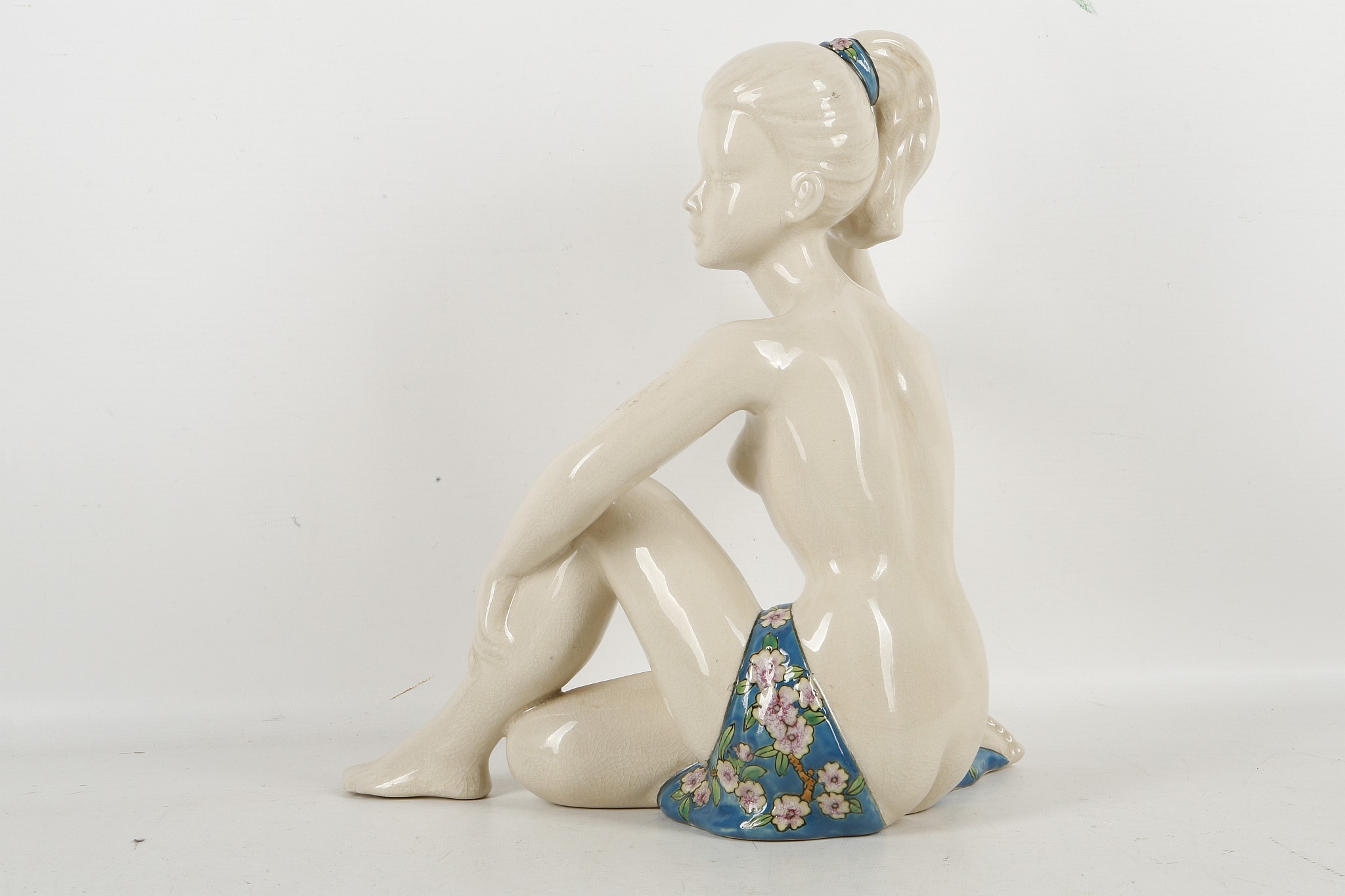 A French porcelain figure of a nude girl kneeling with enamelled drape and headband. - Image 2 of 3