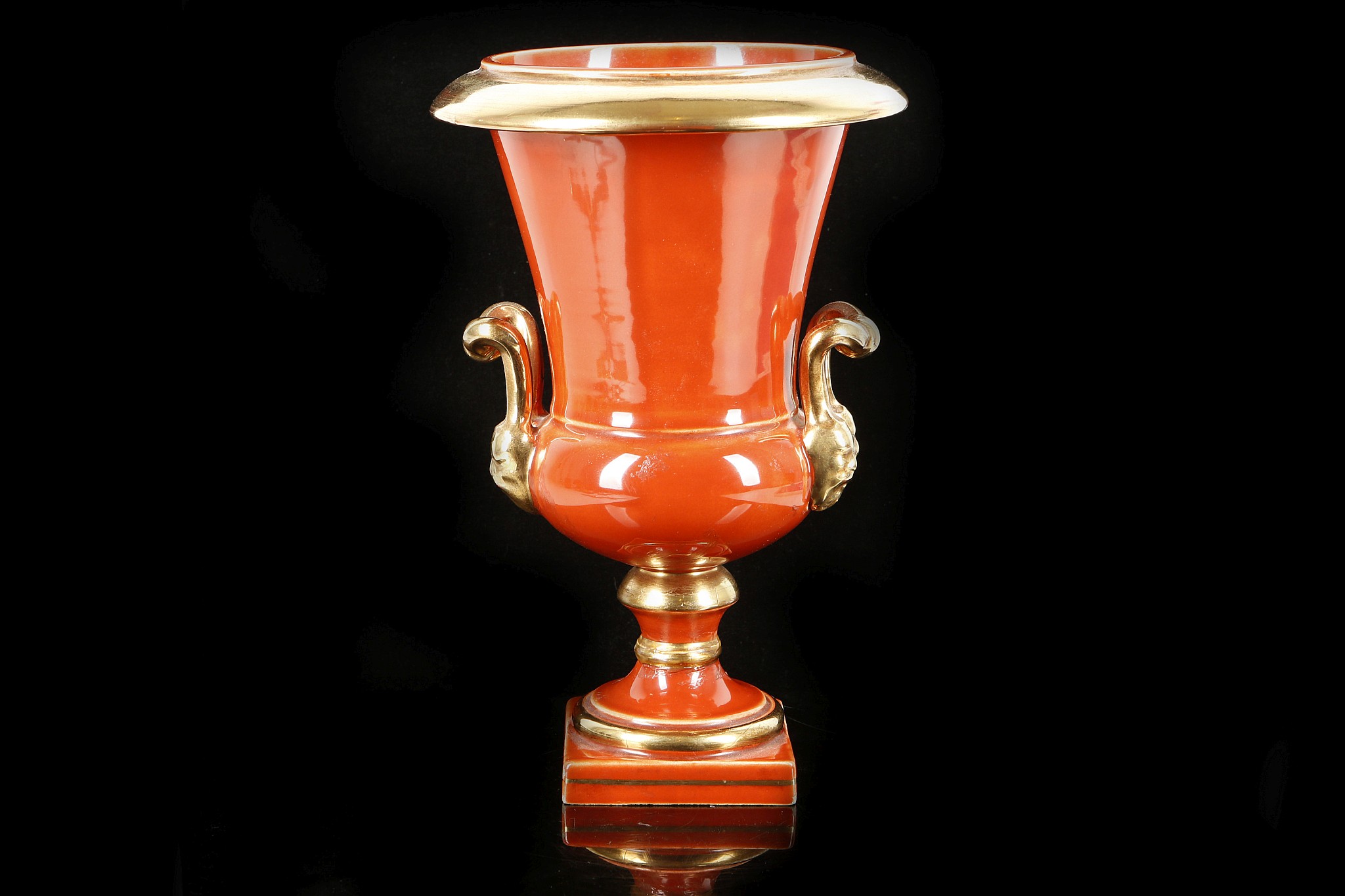 A Sang-de-boeuf glazed inverted campana form ceramic twin handled urn, on socle plinth, with gilt - Image 2 of 2