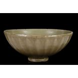 A CHINESE LONGQUAN CELADON LOTUS BOWL. Song - Yuan Dynasty. With rounded sides standing on a short