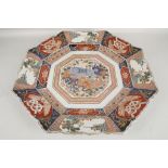 A large Japanese octagonal Imari pattern dish in typical palette, together with two Qing Chinese