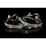 A pair of 18ct white gold and diamond set hoop clip earrings. Diamond: 2ct total est.