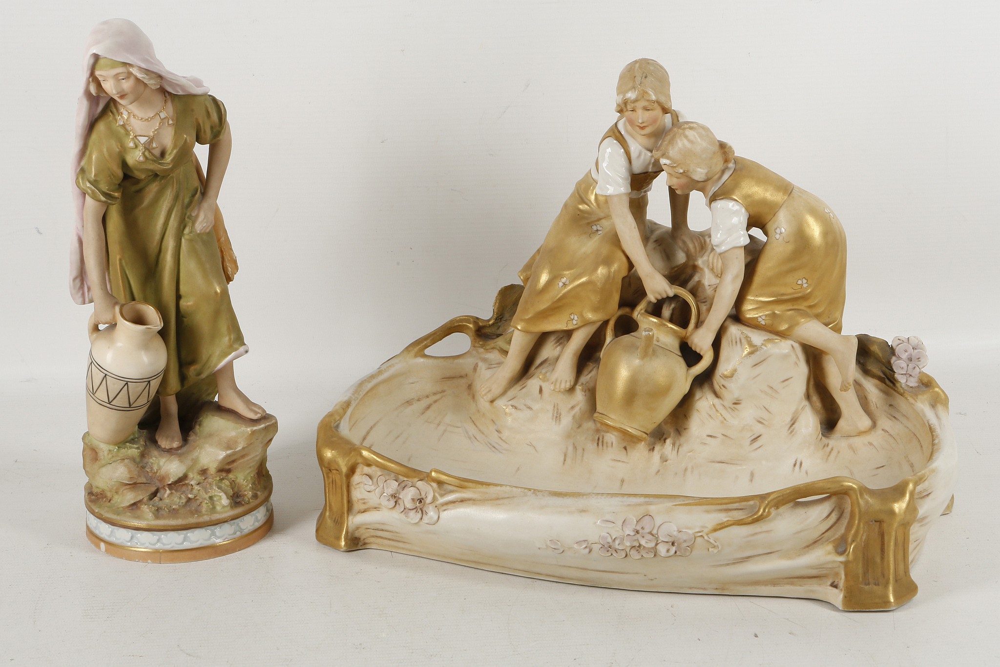 Two Royal Dux items, c.1900, to include a girl water carrier on round base, 17.5cm high and an Art