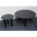 A pair of modern contemporary circular ebonised tables, designed by Patty Johnson and manufactured