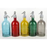 'Martin and Freres Cie', a collection of five coloured glass Seltzer bottles, in red, blue,