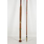 A light marine game fishing rod with nylone and chrome rings, 7th ft long.