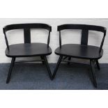 A pair of modern contemporary ebonised Maun Windsor lounge chairs, designed by Patty Johnson and