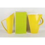 Contemporary vases; two in the form of jugs, approx 30/32cm high, rectangular ribbed 33.2cm (3).