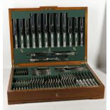 A late 1940's cased canteen of cutlery, stainless steel, by James Dixon & Son of Sheffield, complete