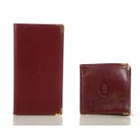 CARTIER BI-FOLD WALLET, Bordeaux leather, 10cm x 1