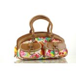 CHRISTIAN DIOR HANDBAG, florally printed canvas wi