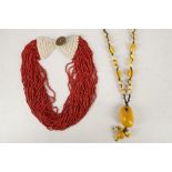 A multi strand coral necklace, being sold together