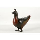 A Chinese or Japanese lacquered bronze duck form c