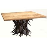 A MODERN ELK ANTLER TABLE - the antler base of circular form with square reclaimed pine top, one