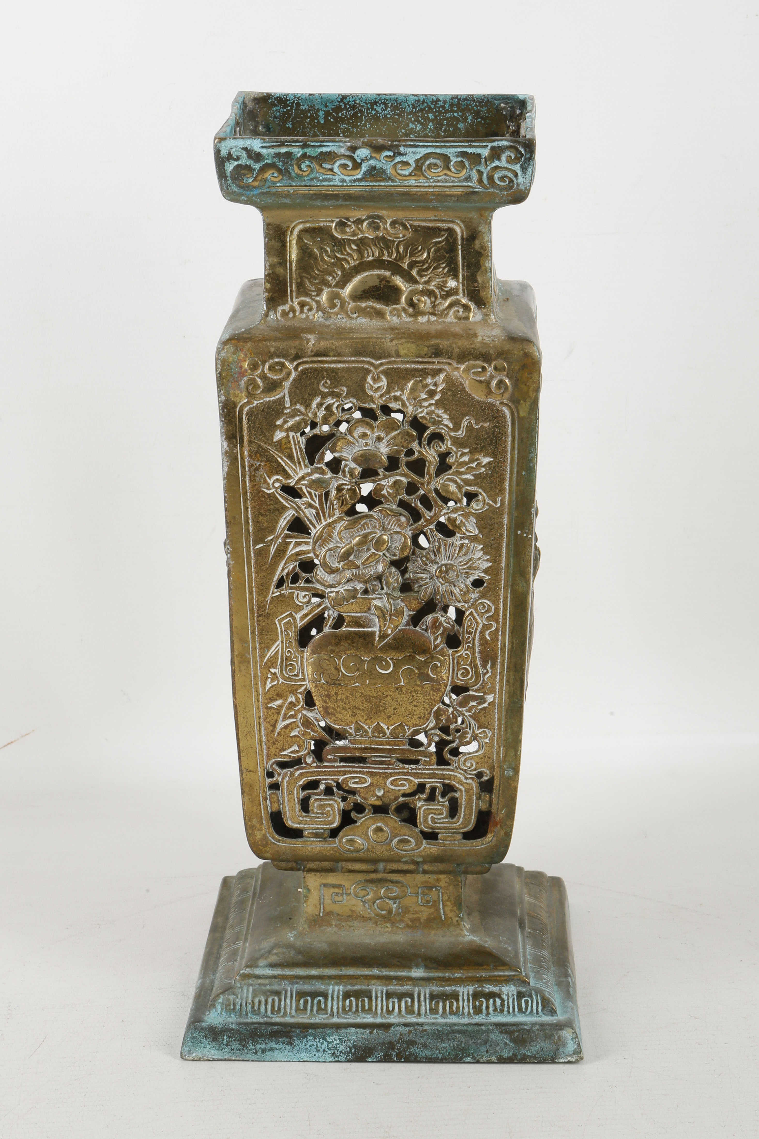 A Chinese copper alloy square section reticulated lantern, the sides decorated with vases filled