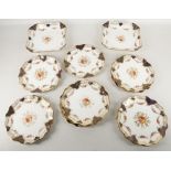 A Wedgwood set of 12 dessert plates and 2 serving