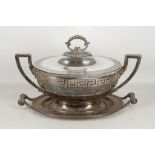 An antique silver plated twin handled soup tureen