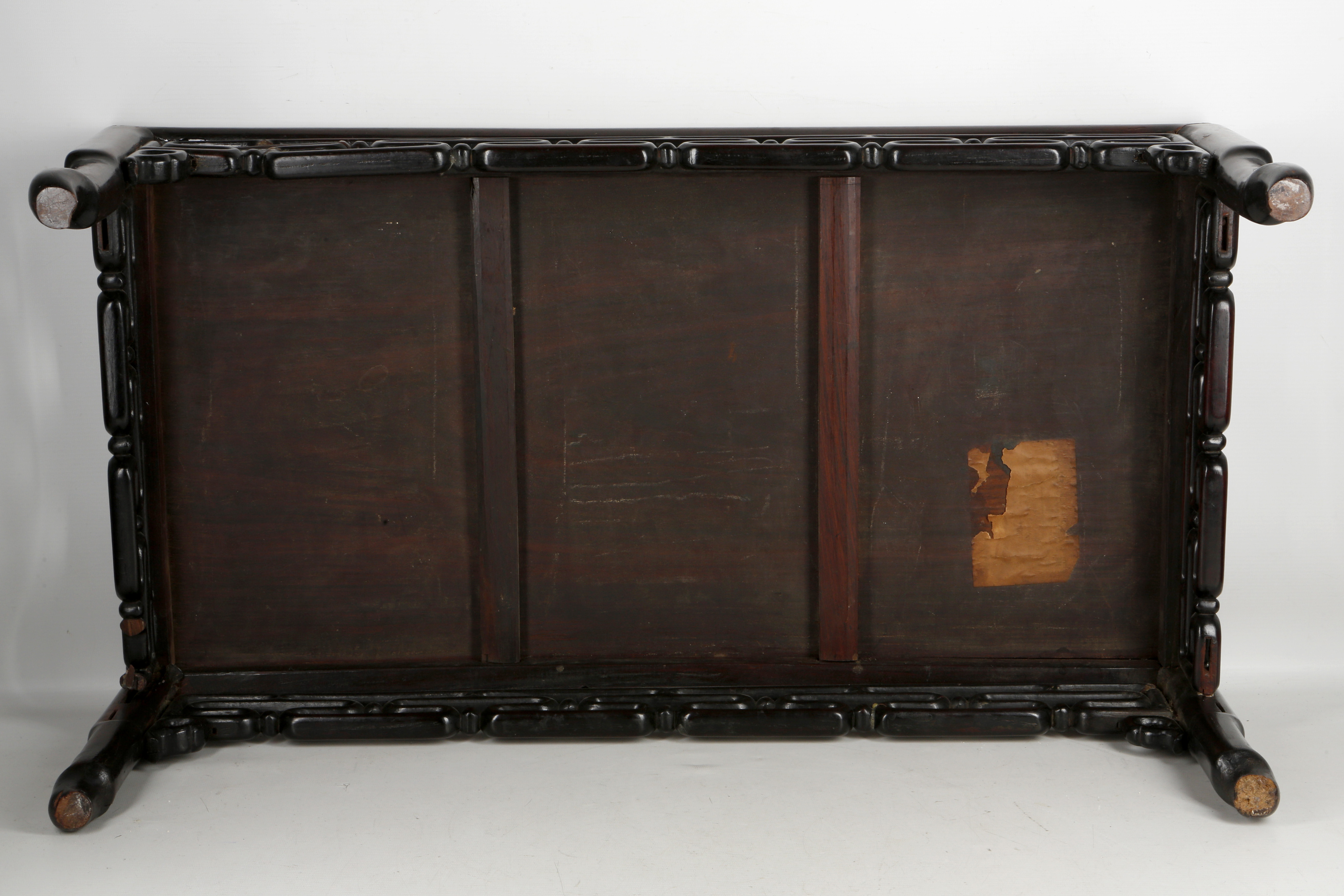 A Chinese wooden low table, well patinated with carved and pierced geometric arrows, early mid - Image 3 of 3